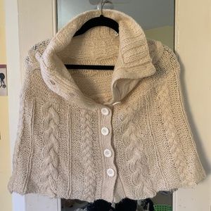 Steve Madden Off Winter White Shoulder Cape with cable knit detail.